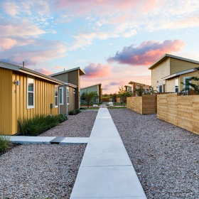 Lifestyle at Estates at Plum Creek walkway in between rental homes in Kyle, Texas